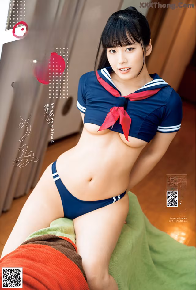 A woman in a sailor outfit is posing for a magazine.